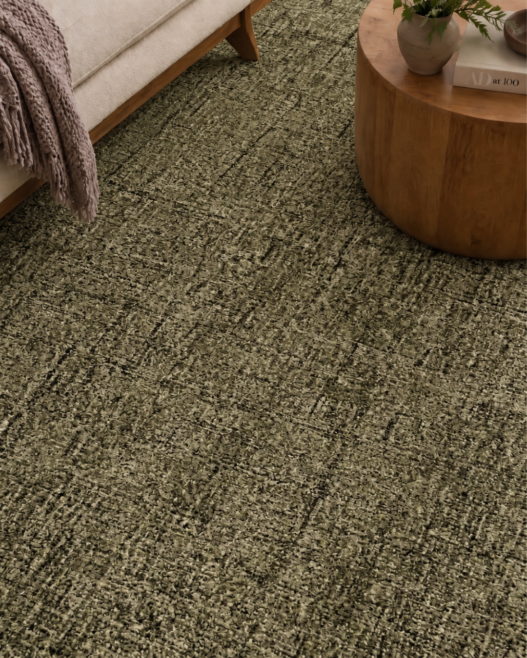 Dalyn Rugs Calisa CS5 Basil Style Shot — Close-up of textured basil green area rug with modern furniture.