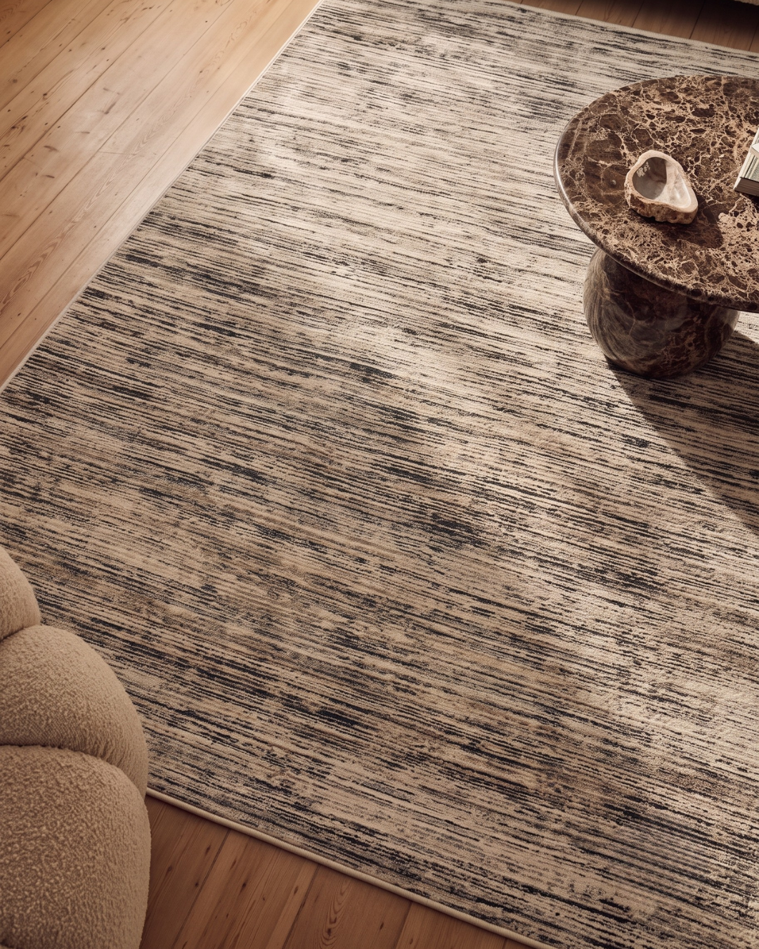 Dalyn Rugs Denizi DZ1 Midnight Style Shot — Midnight and ivory striped area rug styled with modern furniture.