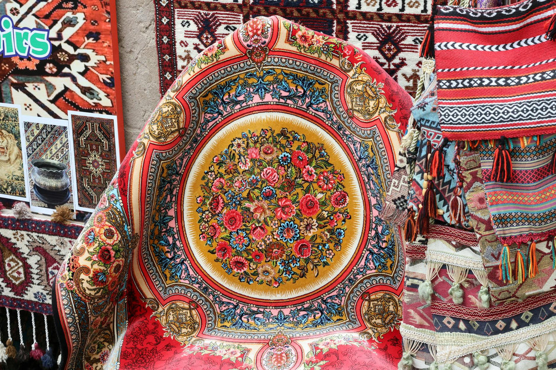 Colorful Persian rugs and textiles gallery showcasing intricate patterns and vibrant designs.