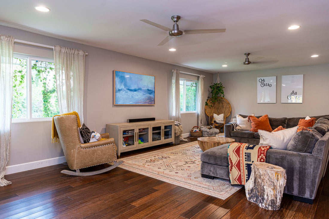 Elegant living room featuring a cozy sofa, modern decor, and natural accents.