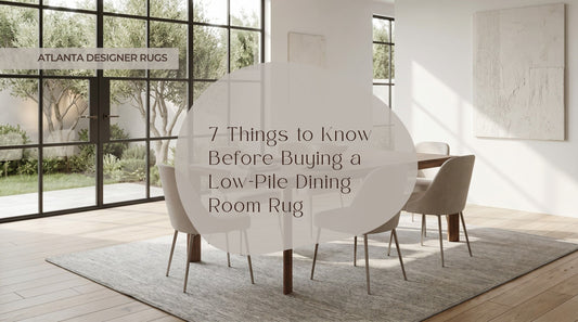 Low pile dining room rug in Calvin Klein Jackson CK781 Beige Grey, styled in a bright modern dining room with soft natural light