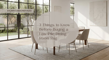 Low pile dining room rug in Calvin Klein Jackson CK781 Beige Grey, styled in a bright modern dining room with soft natural light