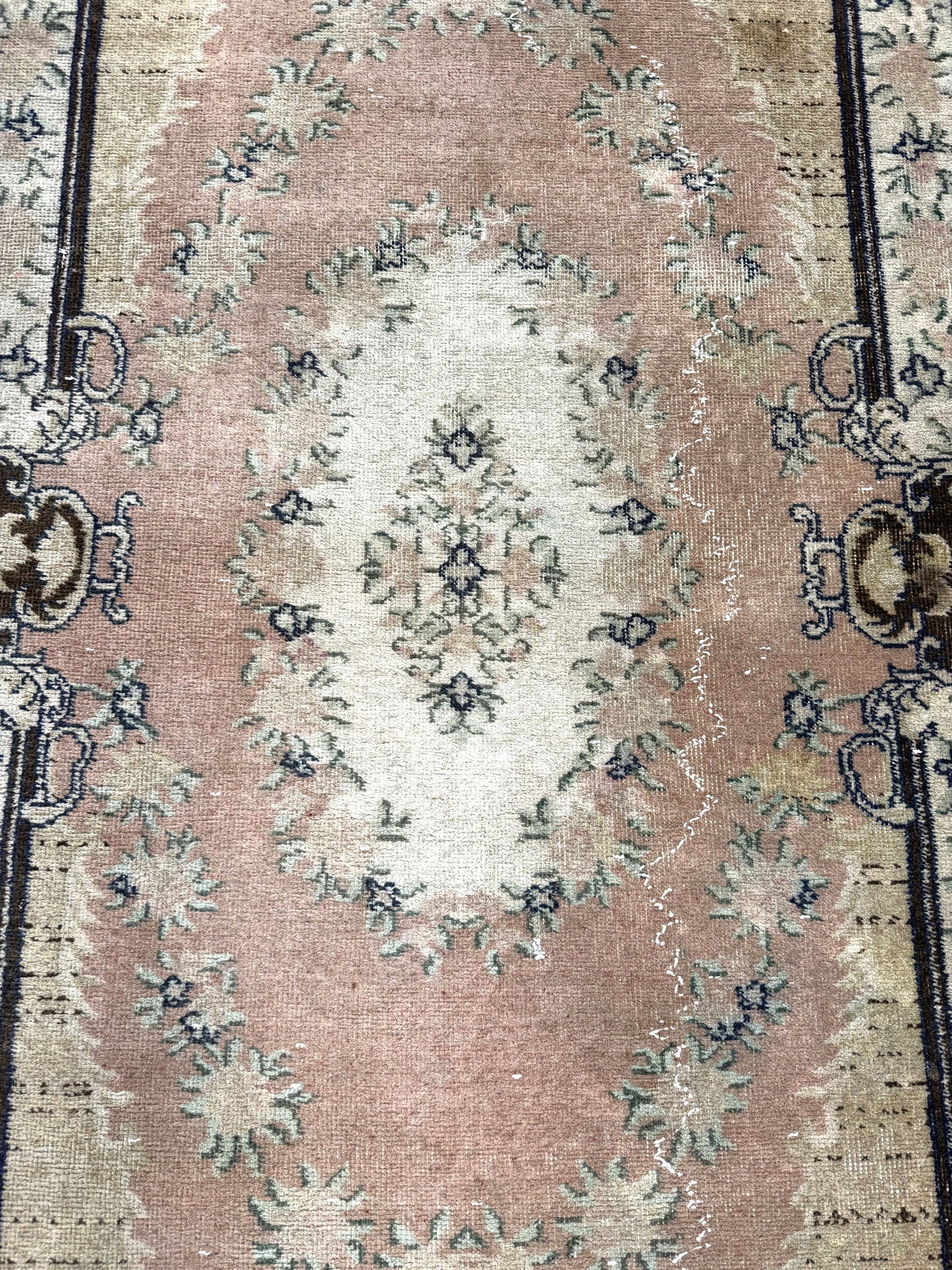 Artisan Angelina vintage Turkish rug styled in a modern Atlanta living room