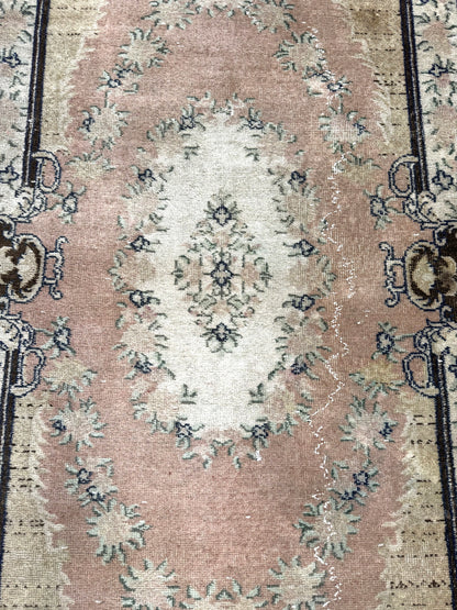 Artisan Angelina vintage Turkish rug styled in a modern Atlanta living room