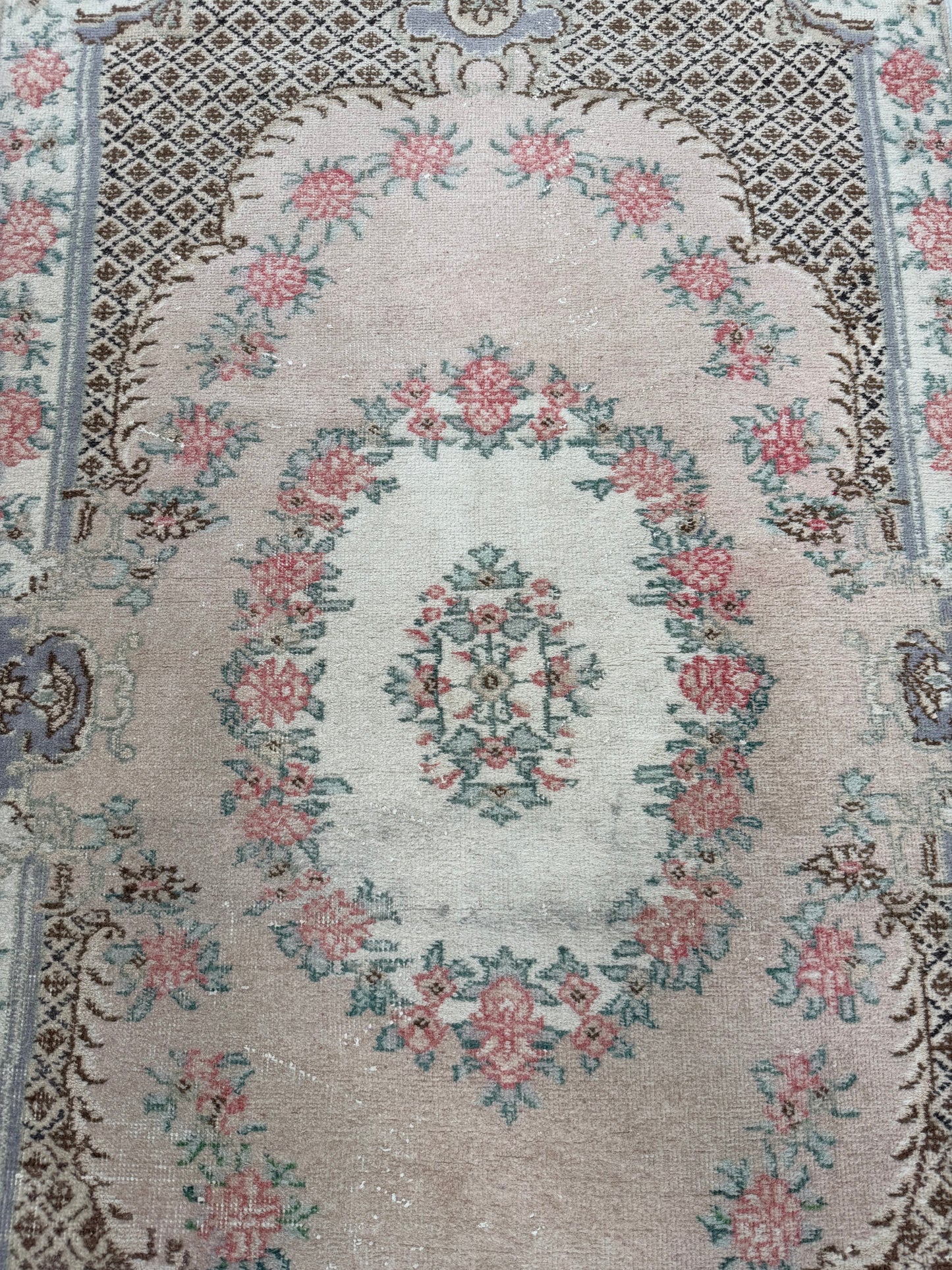 Artisan Angelina vintage Turkish rug styled in a modern Atlanta living room