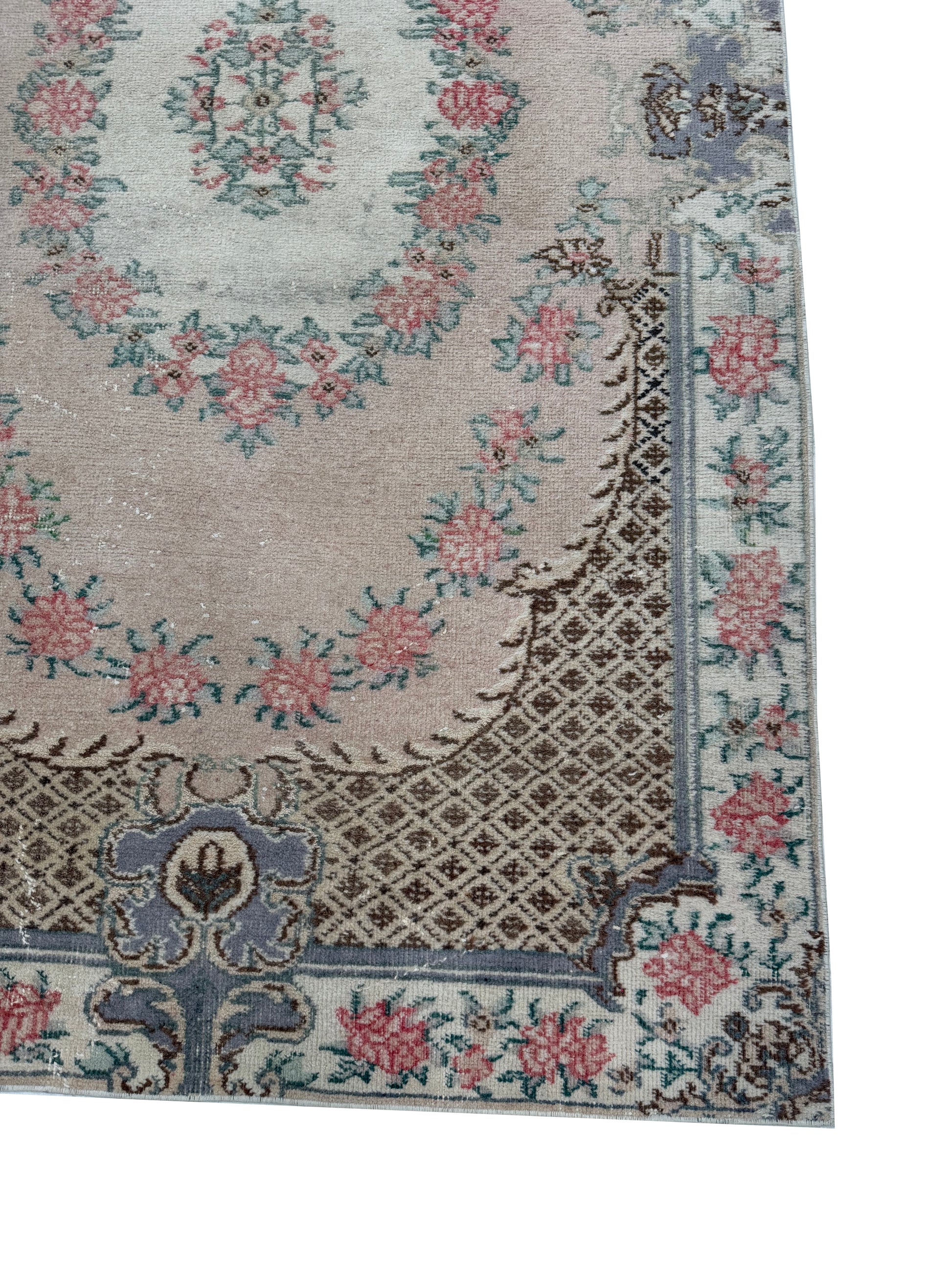 Artisan Angelina Coral rug showing the unique distressed vintage patina and coral hues