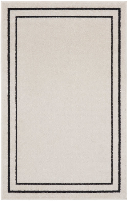 Nourison Home Nourison Essentials NRE02 Ivory Black Contemporary Power-loomed Rug