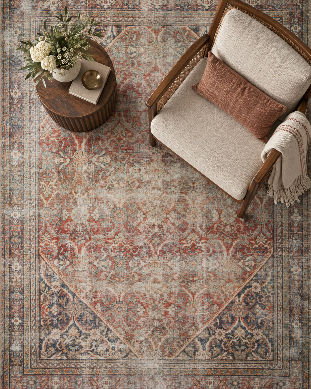 Amber Lewis x Loloi Georgie GER-01 Red Navy Style Shot — Red and navy area rug in a styled interior.