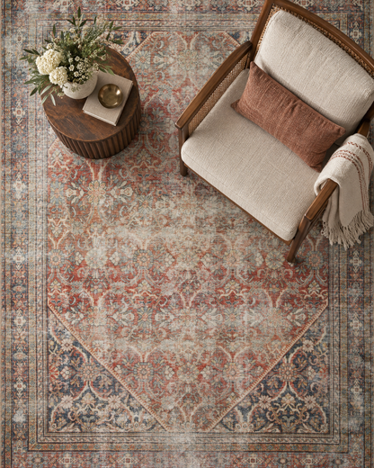 Amber Lewis x Loloi Georgie GER-01 Red Navy Style Shot — Red and navy area rug in a styled interior.
