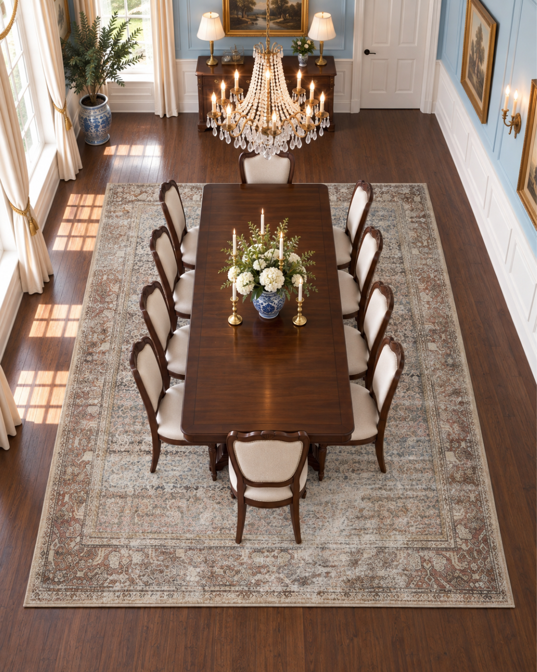 Amber Lewis x Loloi Georgie GER-09 Multi Spice Dining Room Overhead Shot — Overhead view of a multi spice area rug in a dining room.