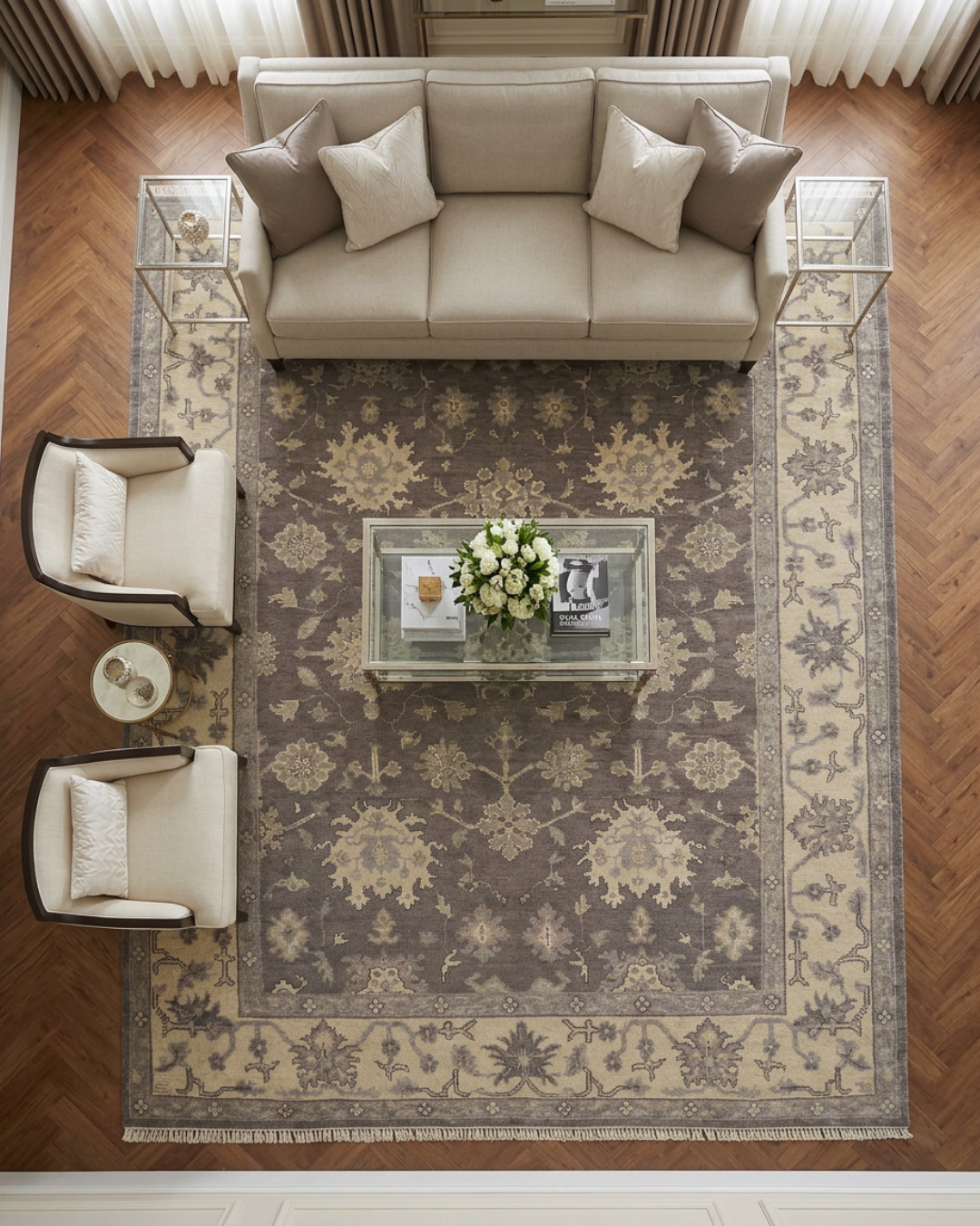 Artisan Emma Pewter Beige Living Room Overhead Shot — Overhead view of a pewter and beige floral rug with an ornate border.