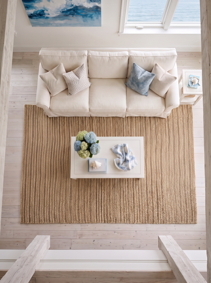Artisan Natural Weave KM103 Natural Living Room Overhead Shot — Overhead view of a ribbed natural rug anchoring a bright living room.