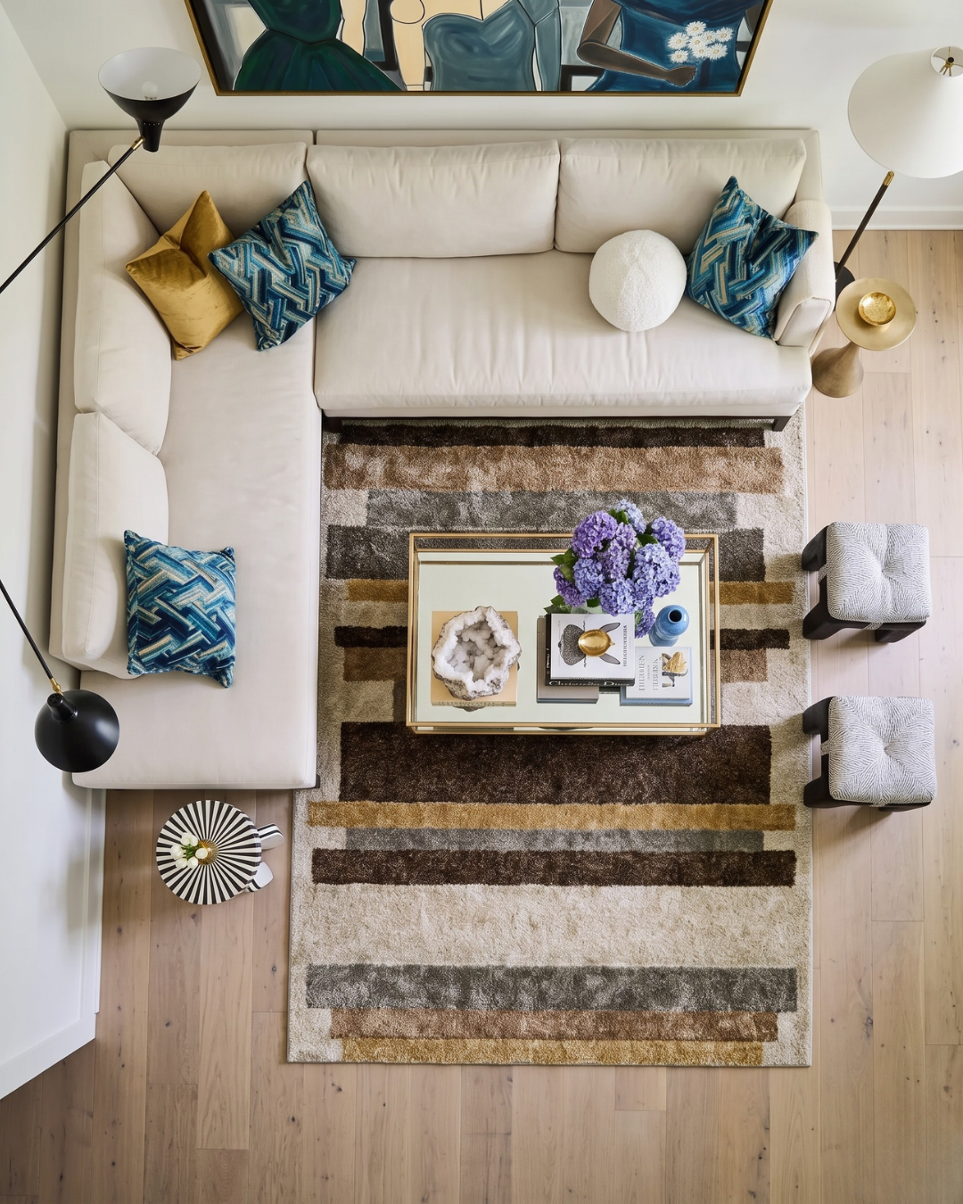 Dalyn Rugs Carmona CO2 Flax Overhead: Overhead view of a Flax striped rug by Dalyn Rugs beneath living room furniture.
