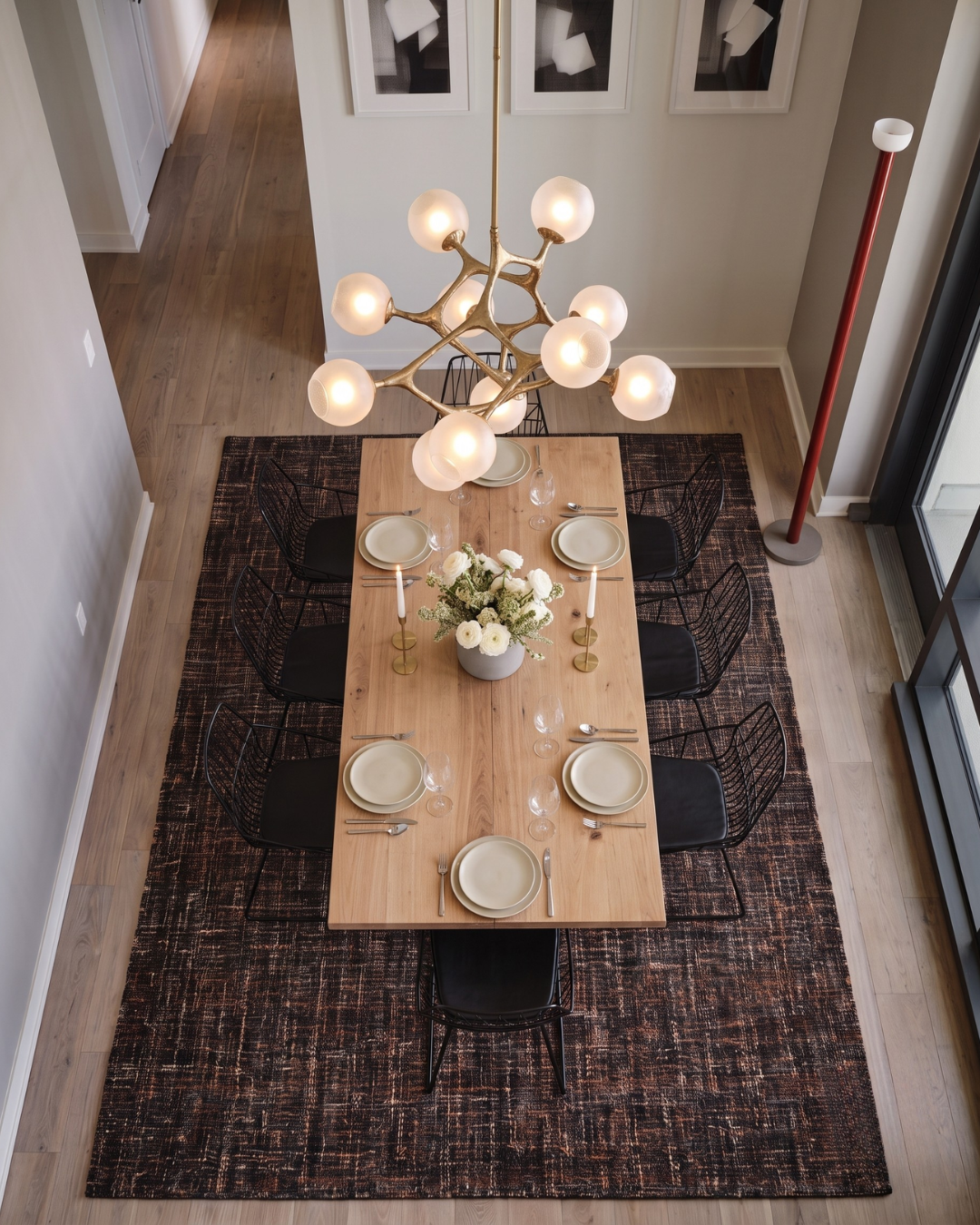 Dalyn Rugs Abruzzo AZ1 Black Dining Room Overhead Shot — Black patterned area rug shown from above.