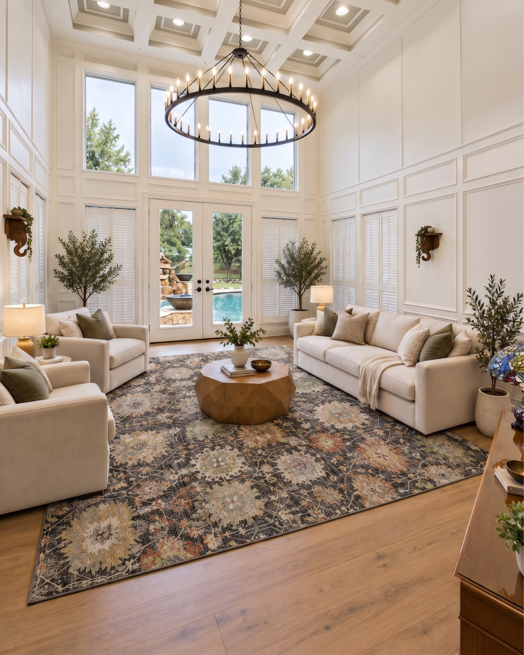 Dalyn Rugs Aristo AR6 Black Living Room — Black multicolor floral area rug in a spacious elegant living room.