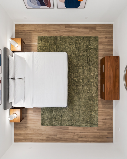 Dalyn Rugs Calisa CS5 Basil Bedroom Overhead Shot — Basil green textured area rug shown from above in a Bedroom.