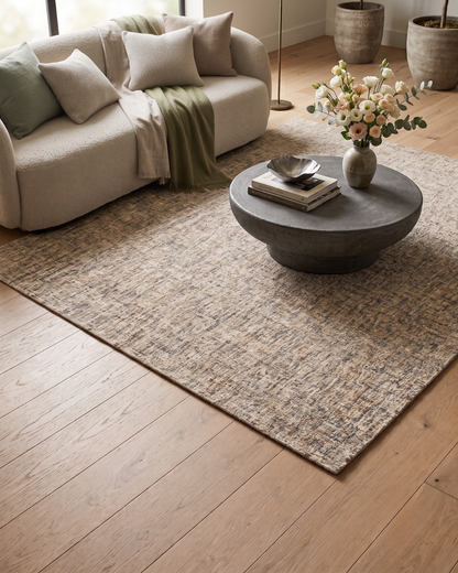 Dalyn Rugs Mateo ME1 Putty Living Room Style Shot — Textured putty area rug styled in a warm contemporary living room.