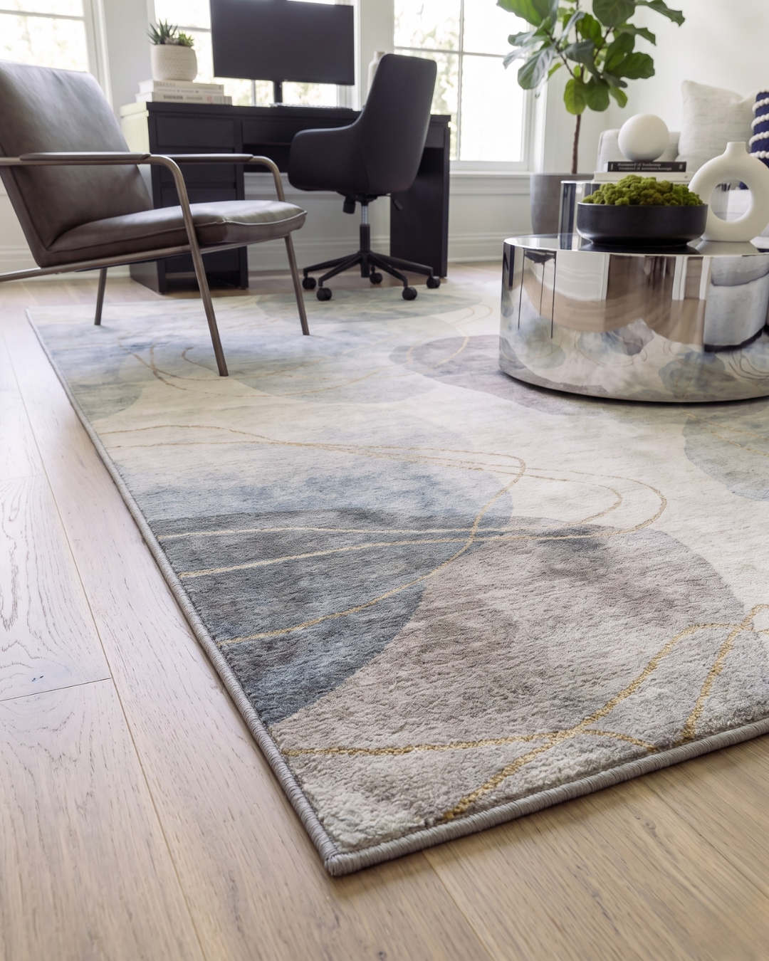 OY15 Pearl Corner: Pearl abstract rug with soft blue and gray tones.