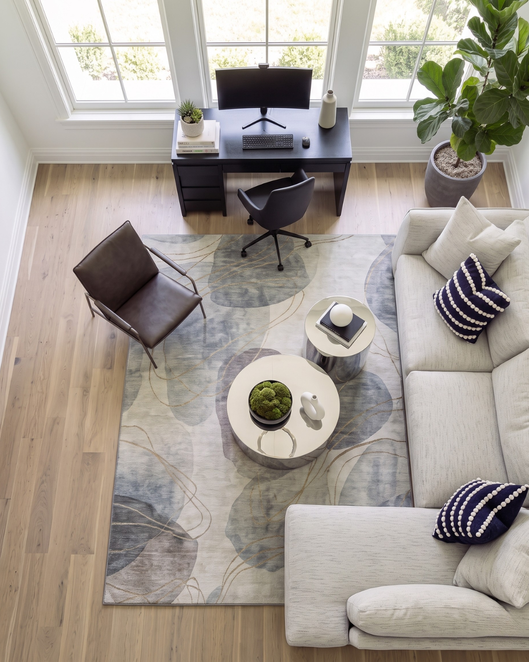 OY15 Pearl Overhead: Pearl abstract rug in a modern living room.
