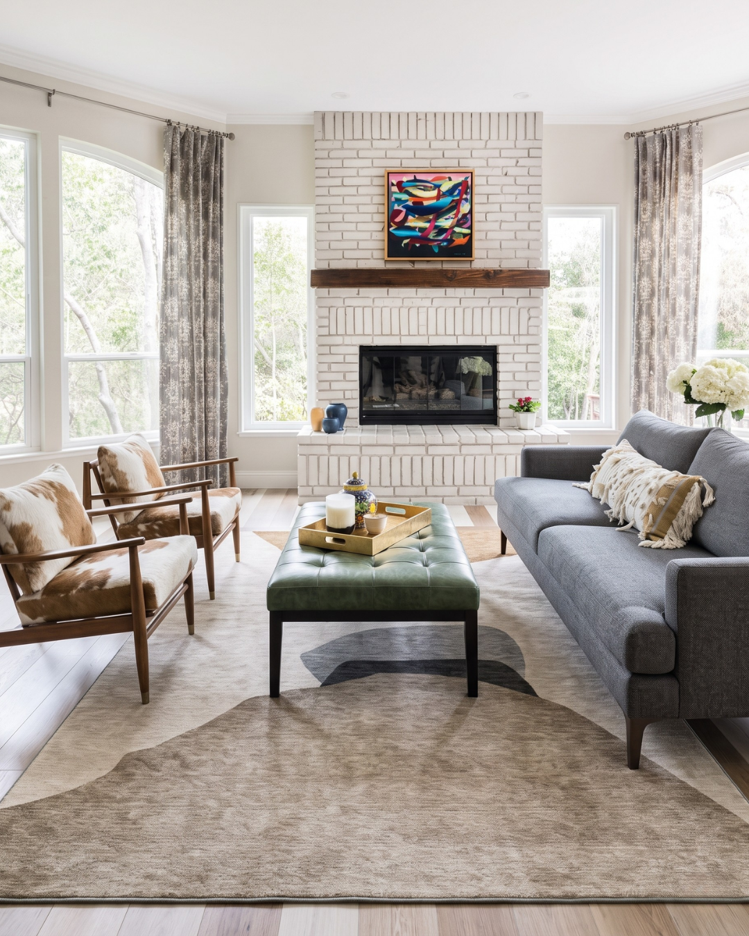 Dalyn Rugs Odyssey OY17 Taupe Living Room — Neutral taupe abstract rug in a modern living room.