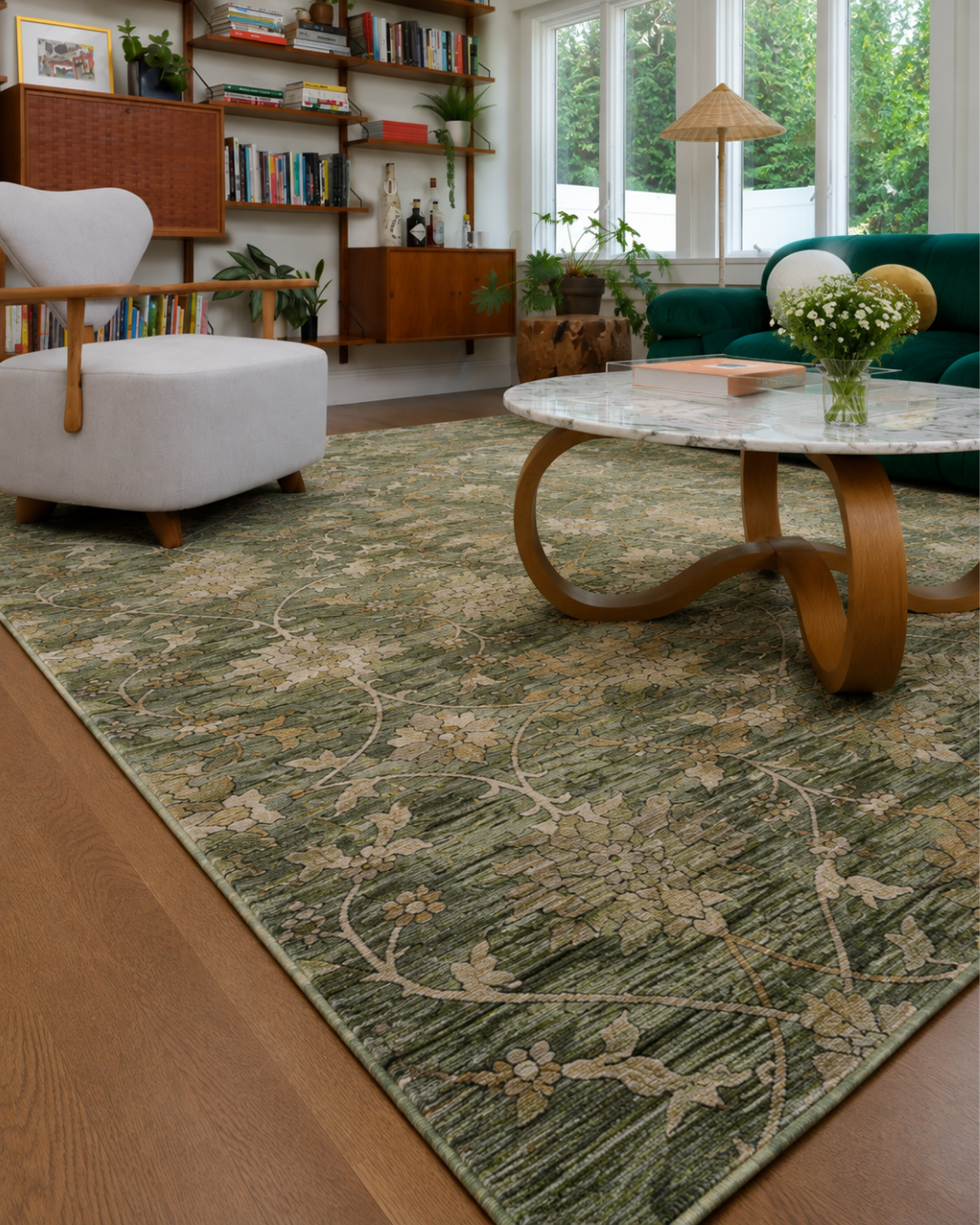 Dalyn Rugs Silk Road SR1 Basil Corner Shot — Green floral patterned area rug in a colorful modern living room.
