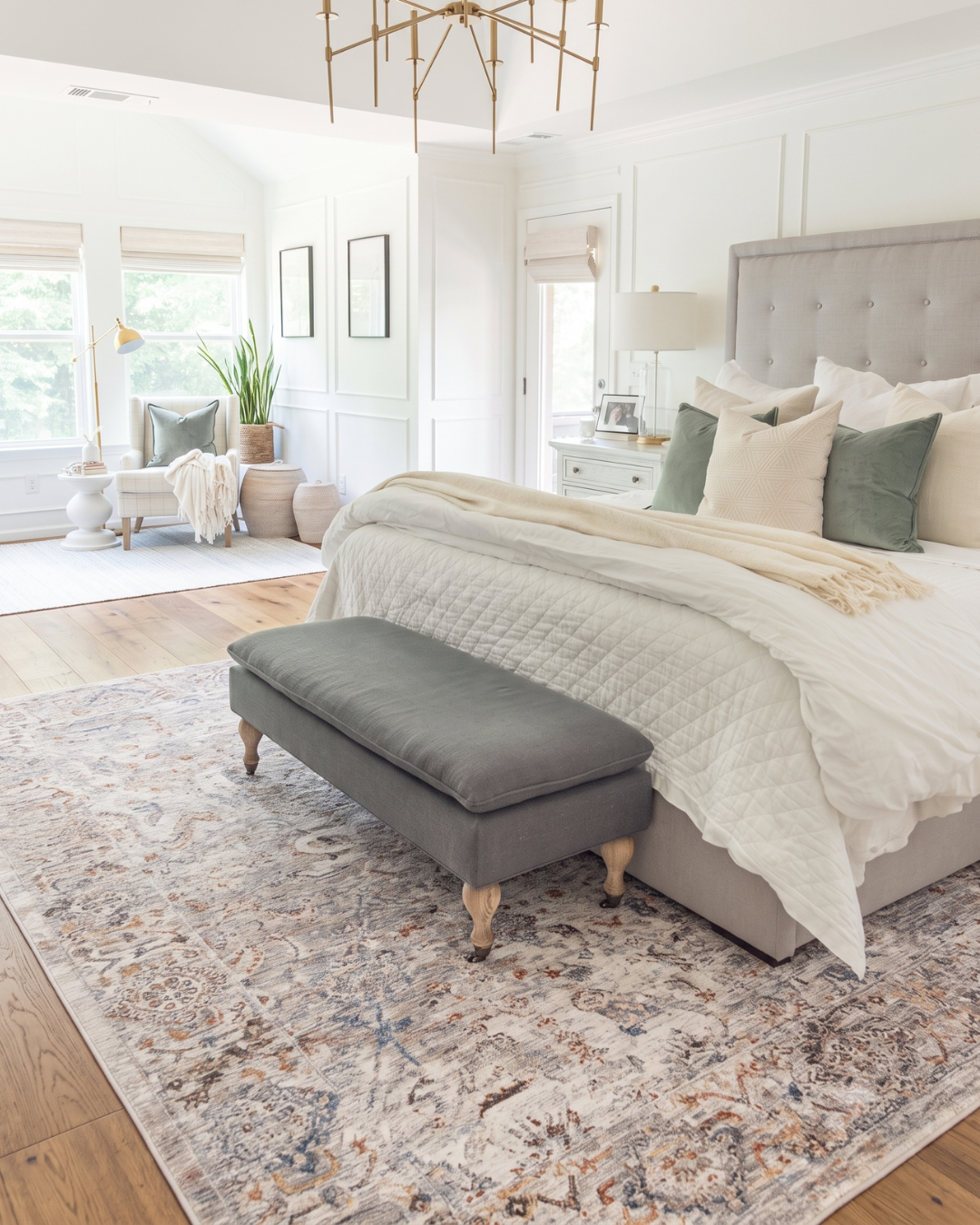 Dalyn Rugs Vienna VI3 Linen Bedroom — Linen traditional area rug with soft blue and rust accents in a bedroom.