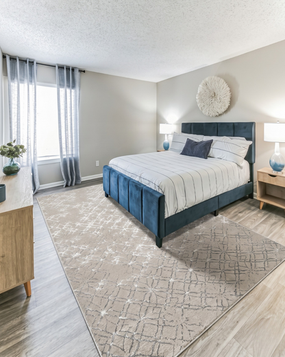 Feizy 3047F Ivory Silver area rug with blue upholstered bed