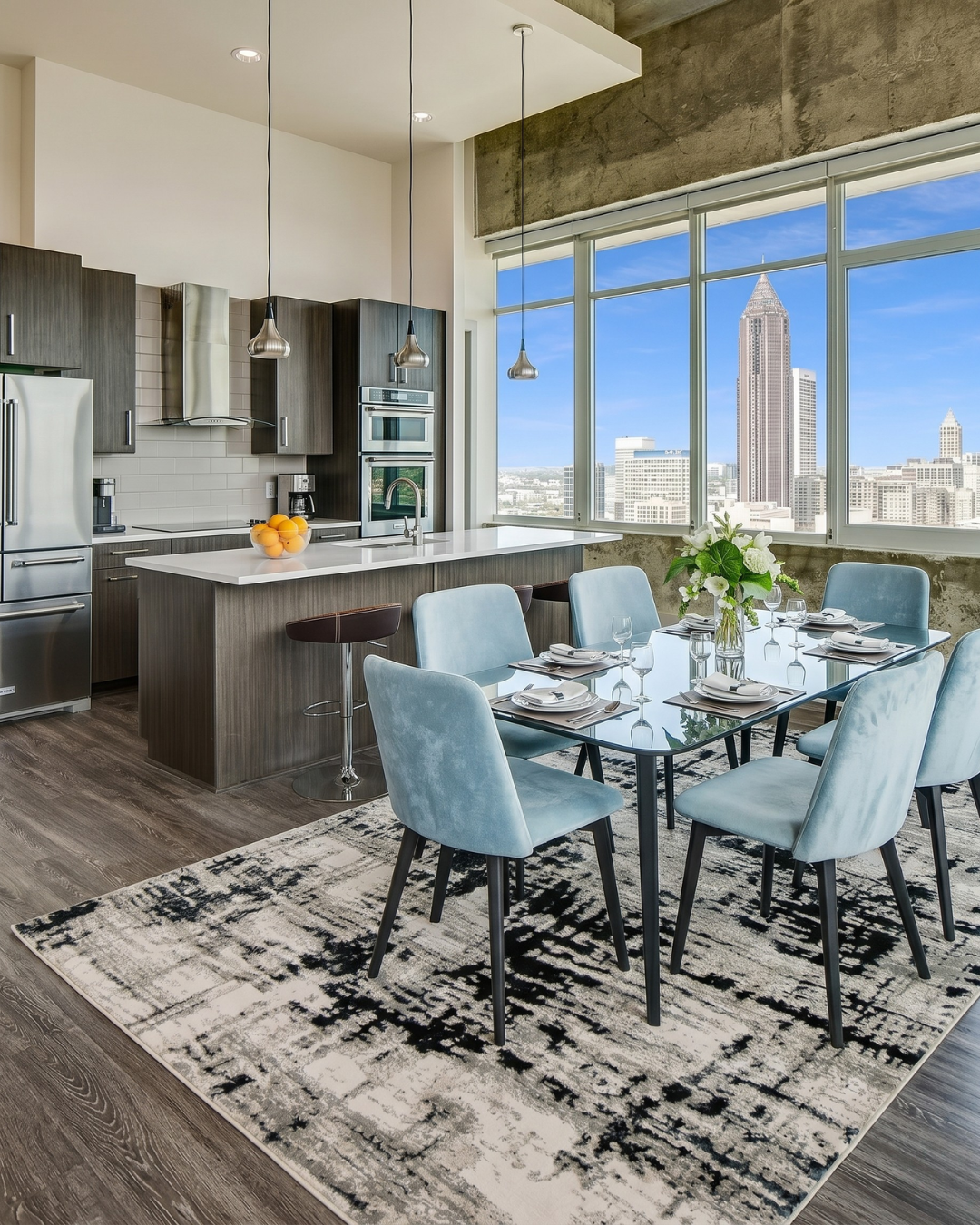 Feizy 3339F Black abstract area rug in dining space
