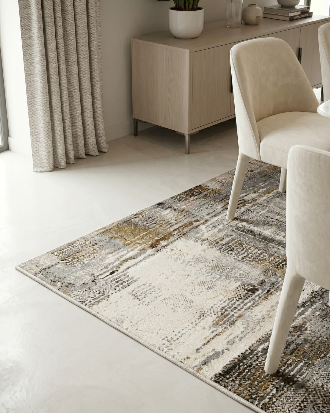 Feizy Clio 39LWF Ivory Multi – Family-friendly abstract rug in a bright living room with soft blue tones.