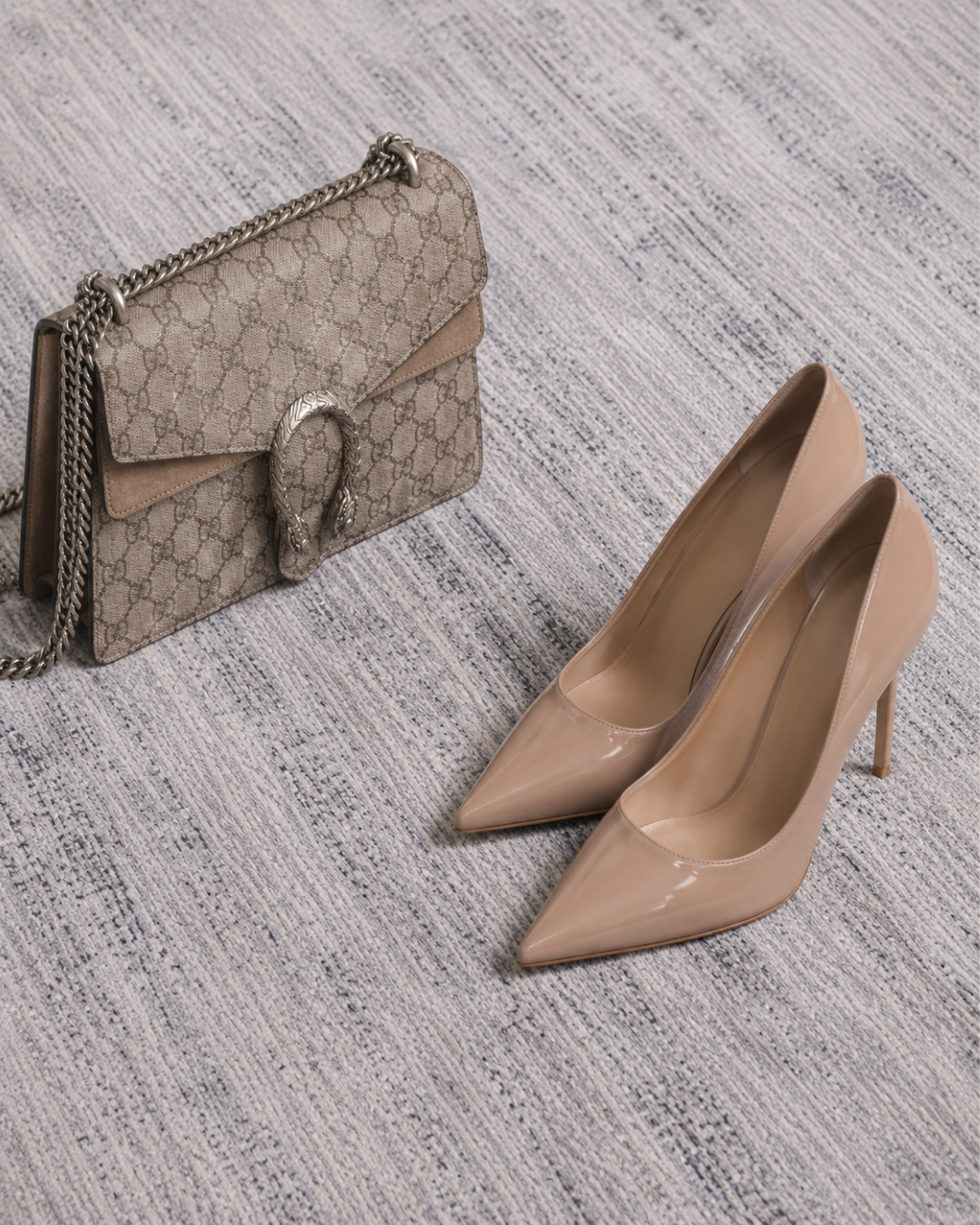 Feizy Deja 39PJF Gray textured neutral rug with designer heels and handbag