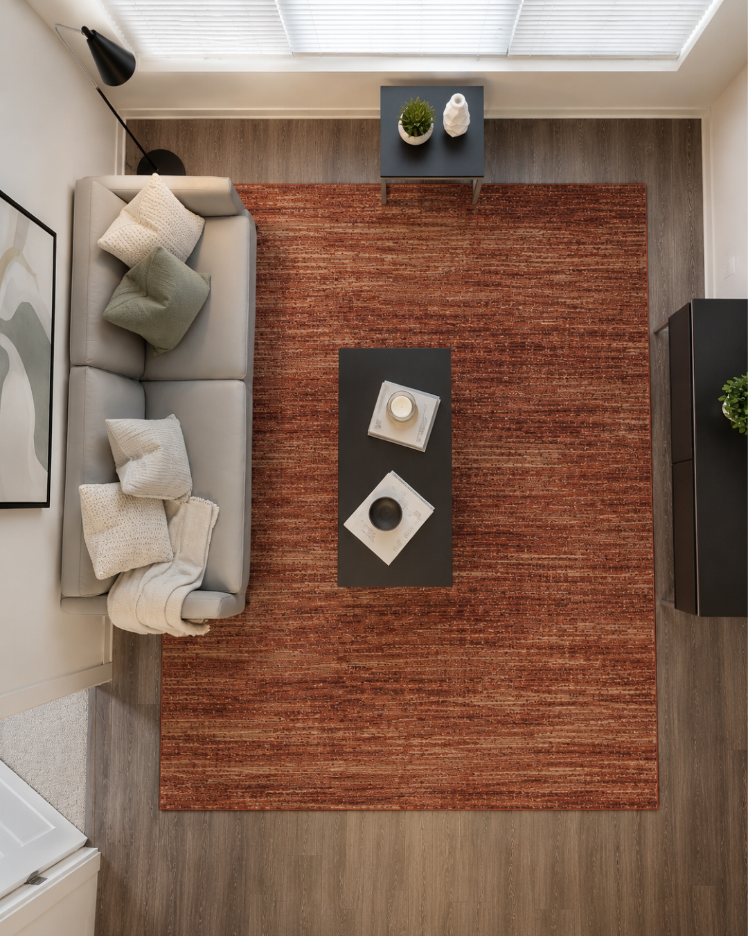 Feizy Deja Rug 39PJF terracotta abstract rug in cozy living room overhead view