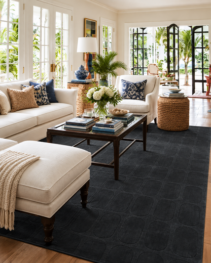 Momeni Rugs Contour CON-2 Navy Living Room Shot — Navy geometric area rug in a light-filled modern living room.