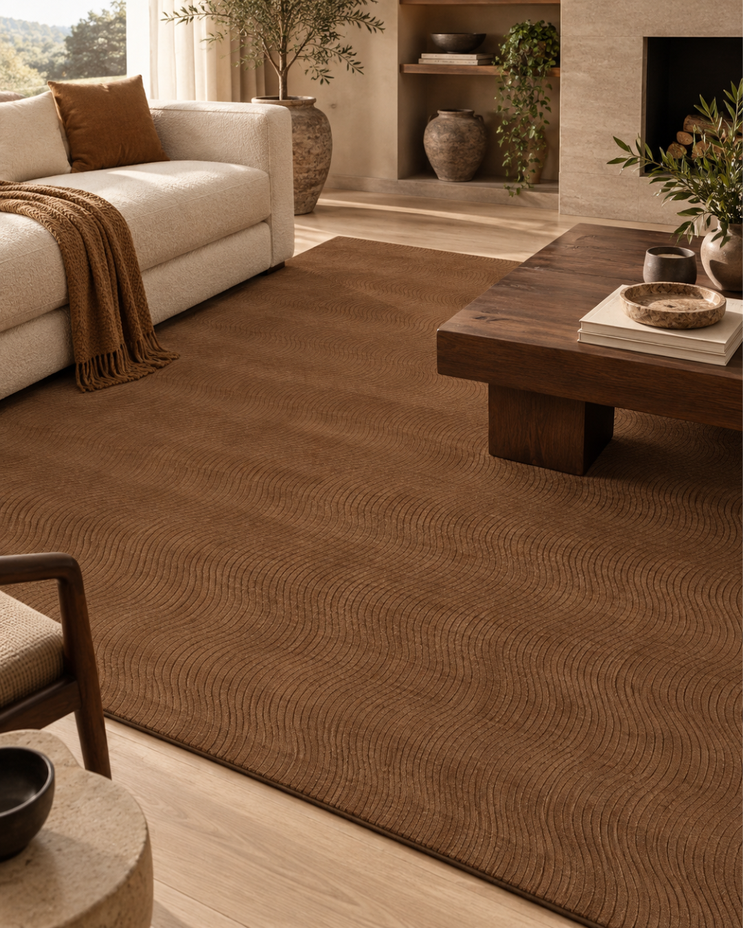 Momeni Contour CON-3 Mocha Style Shot — Mocha wave-pattern area rug close-up in a warm neutral living room.