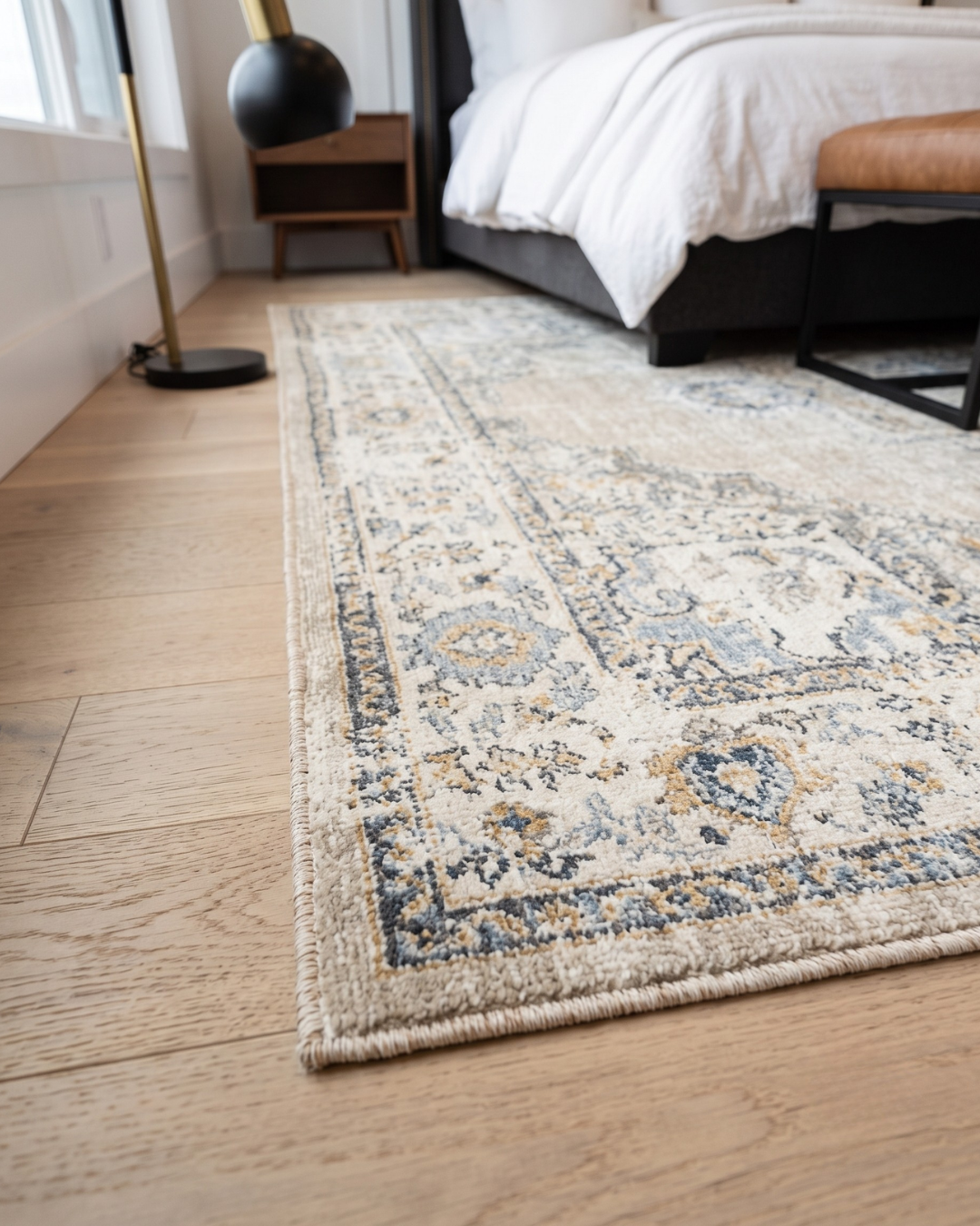 Oriental Weavers Andorra 303D0 Beige Ivory rug corner close-up showing vintage pattern