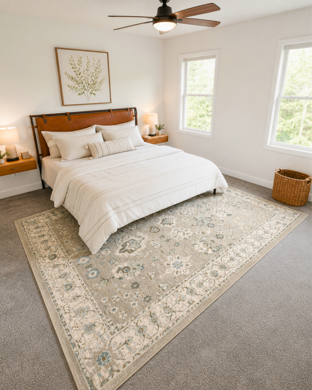 Oriental Weavers Andorra 8930L Beige Ivory traditional area rug styled beneath a bed.