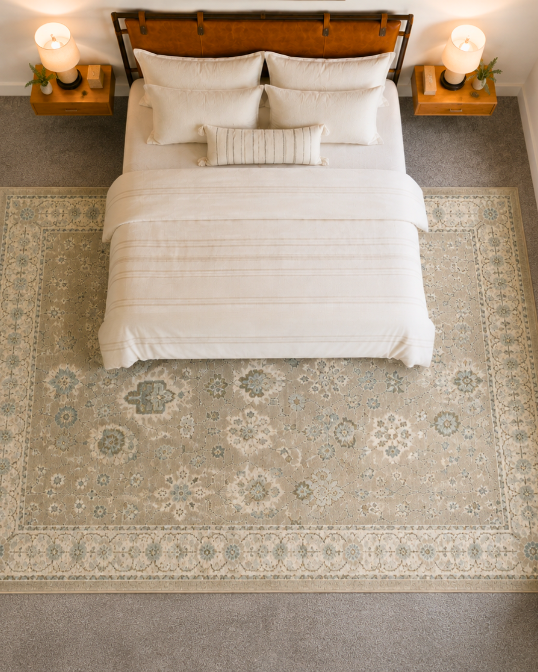 Oriental Weavers Andorra 8930L Beige Ivory vintage-inspired rug in a bedroom overhead view.