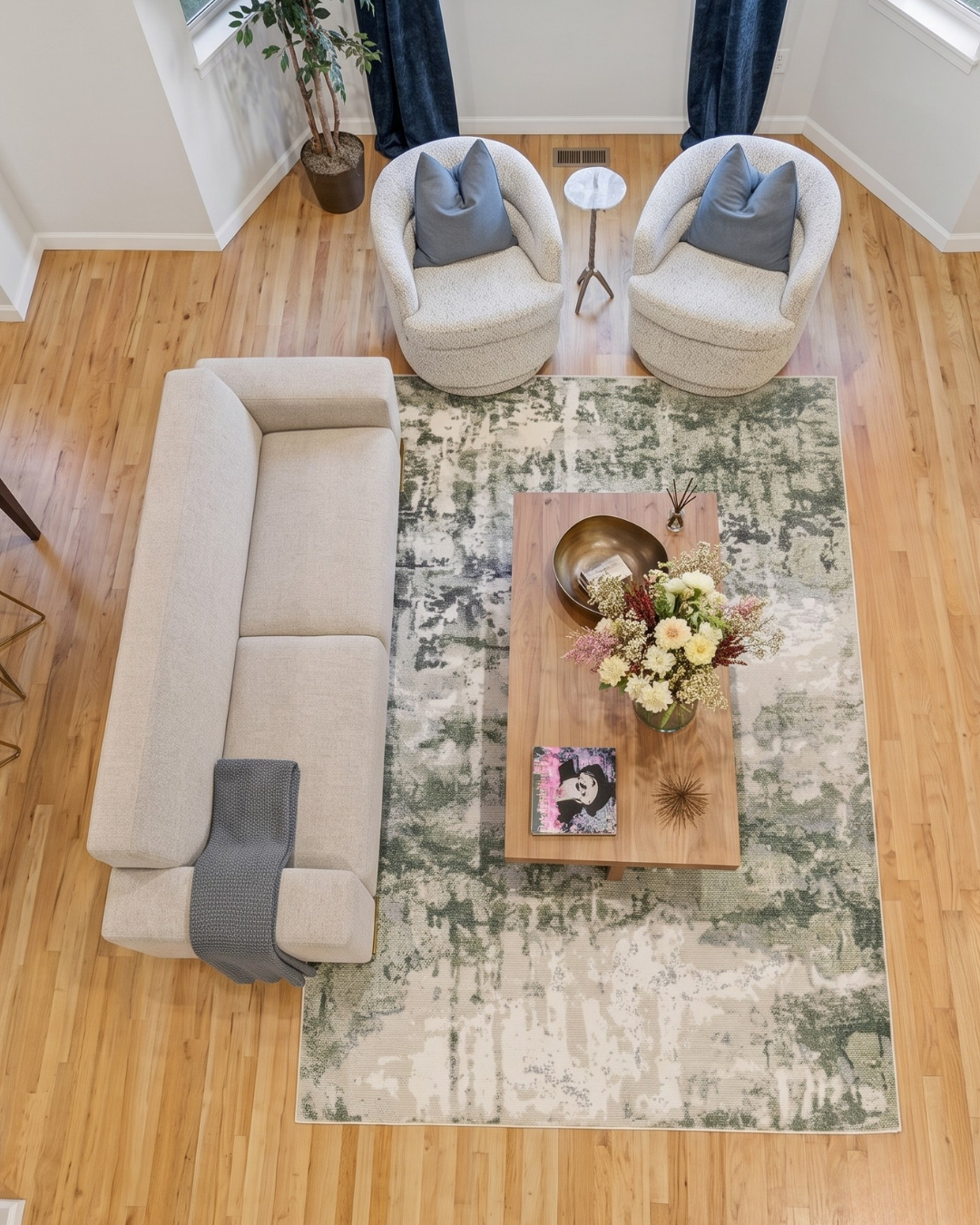 Oriental Weavers Caravan 2061W Beige Green abstract rug in modern living room overhead view