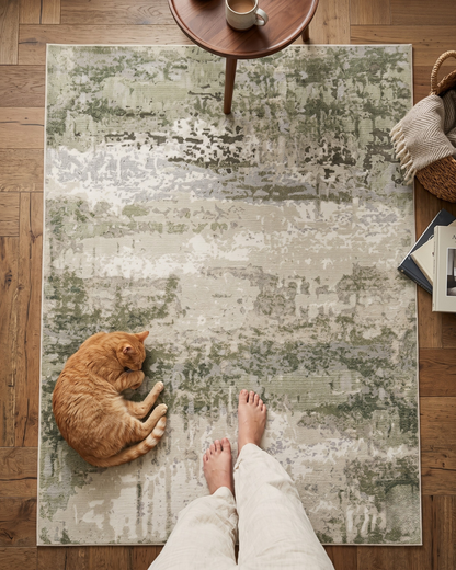 Oriental Weavers Caravan 2061W Beige Green abstract rug style shot with cat