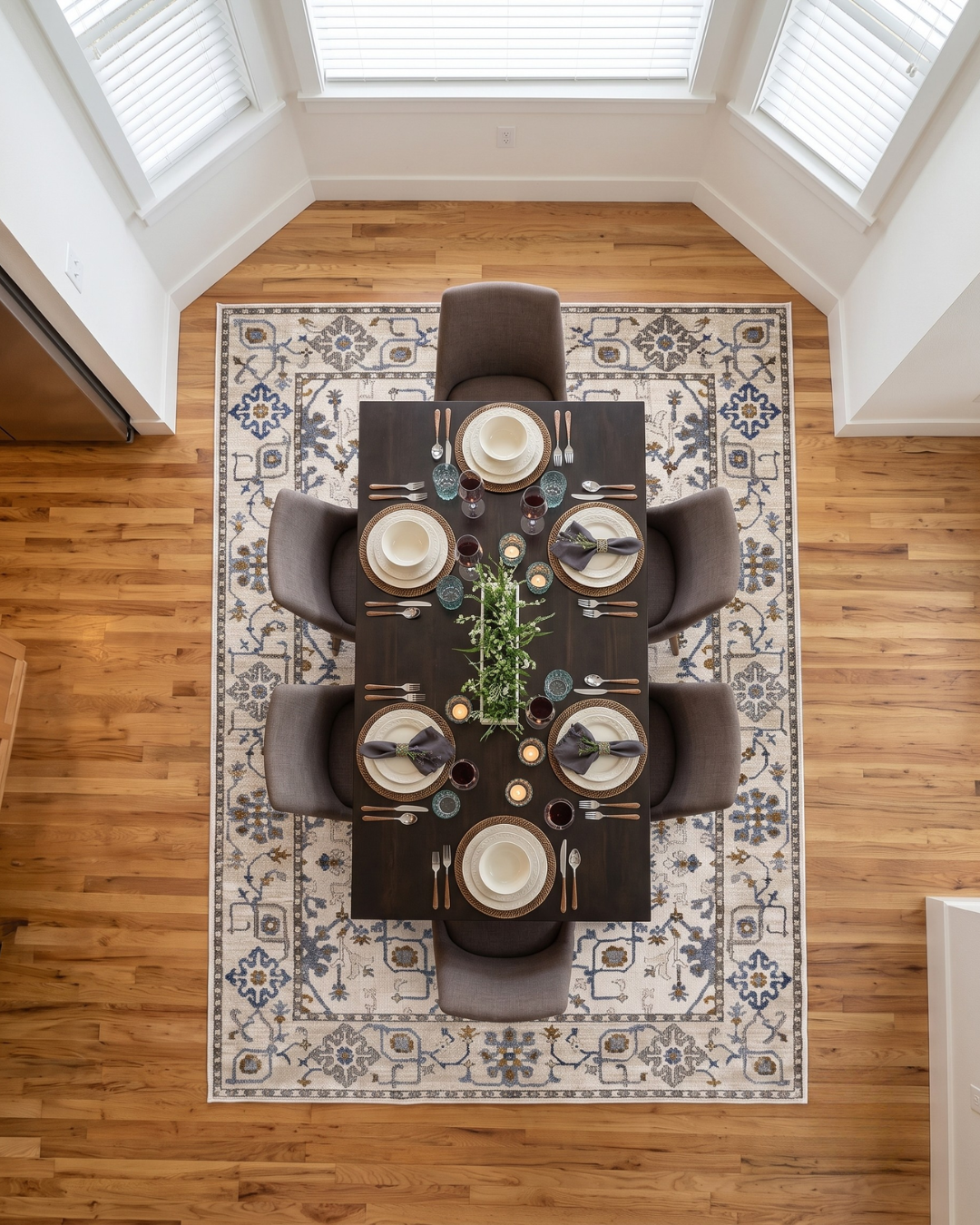 Oriental Weavers Ellington ELL10 Ivory Blue rug in elegant dining room overhead view