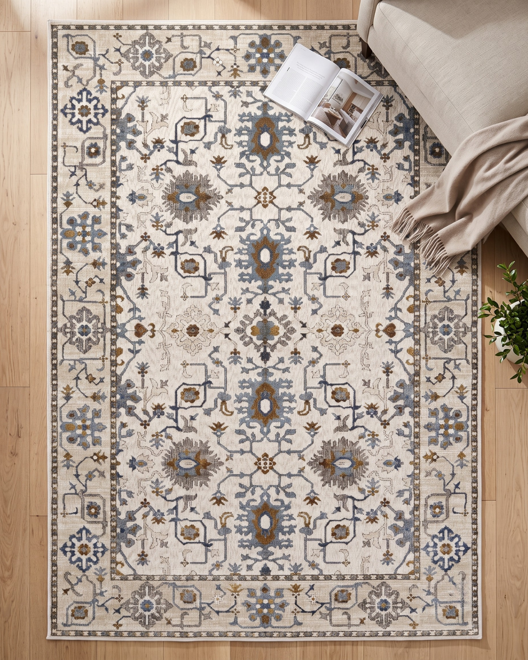 Oriental Weavers Ellington ELL10 Ivory Blue floral rug styled in contemporary living space