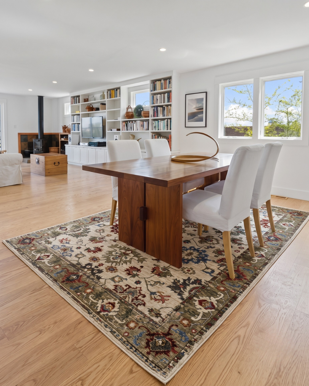 Oriental Weavers Hastings HA03W Ivory Green traditional area rug in dining room
