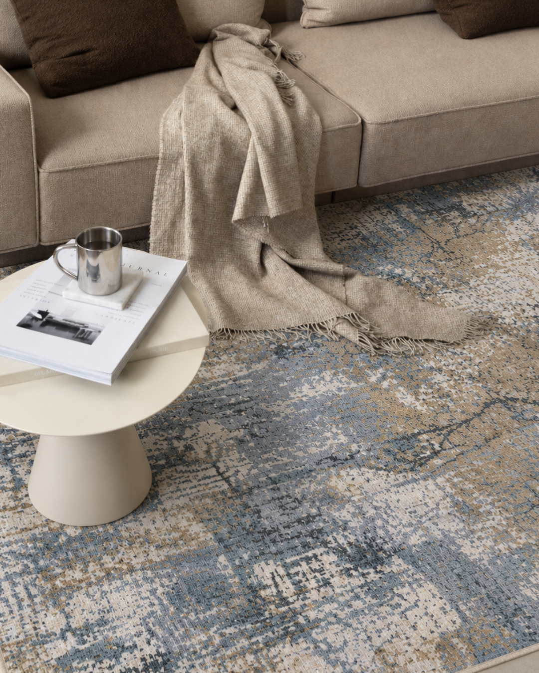 Oriental Weavers Hayden HAY08 Beige Blue abstract rug styled with sofa and table