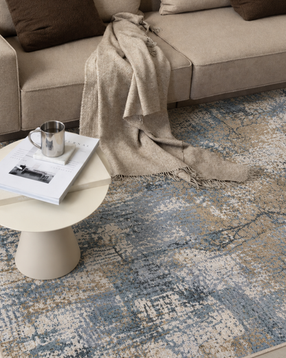 Oriental Weavers Hayden HAY08 Beige Blue abstract rug styled with sofa and table