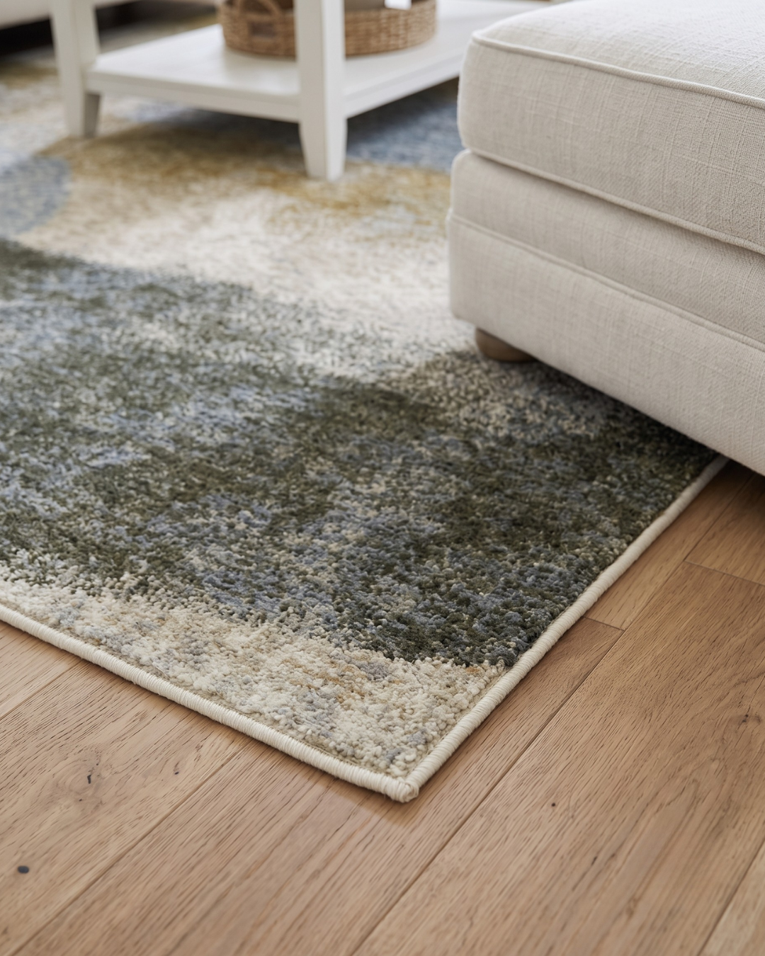 Oriental Weavers Hayden HAY09 Beige Gold abstract rug corner detail in living room