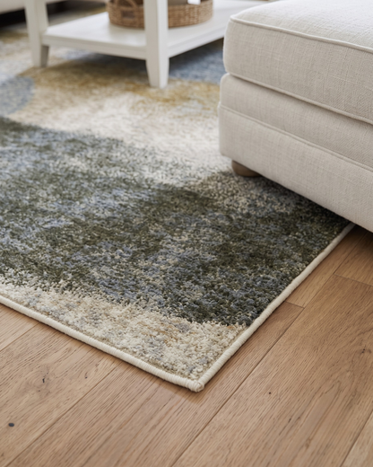 Oriental Weavers Hayden HAY09 Beige Gold abstract rug corner detail in living room