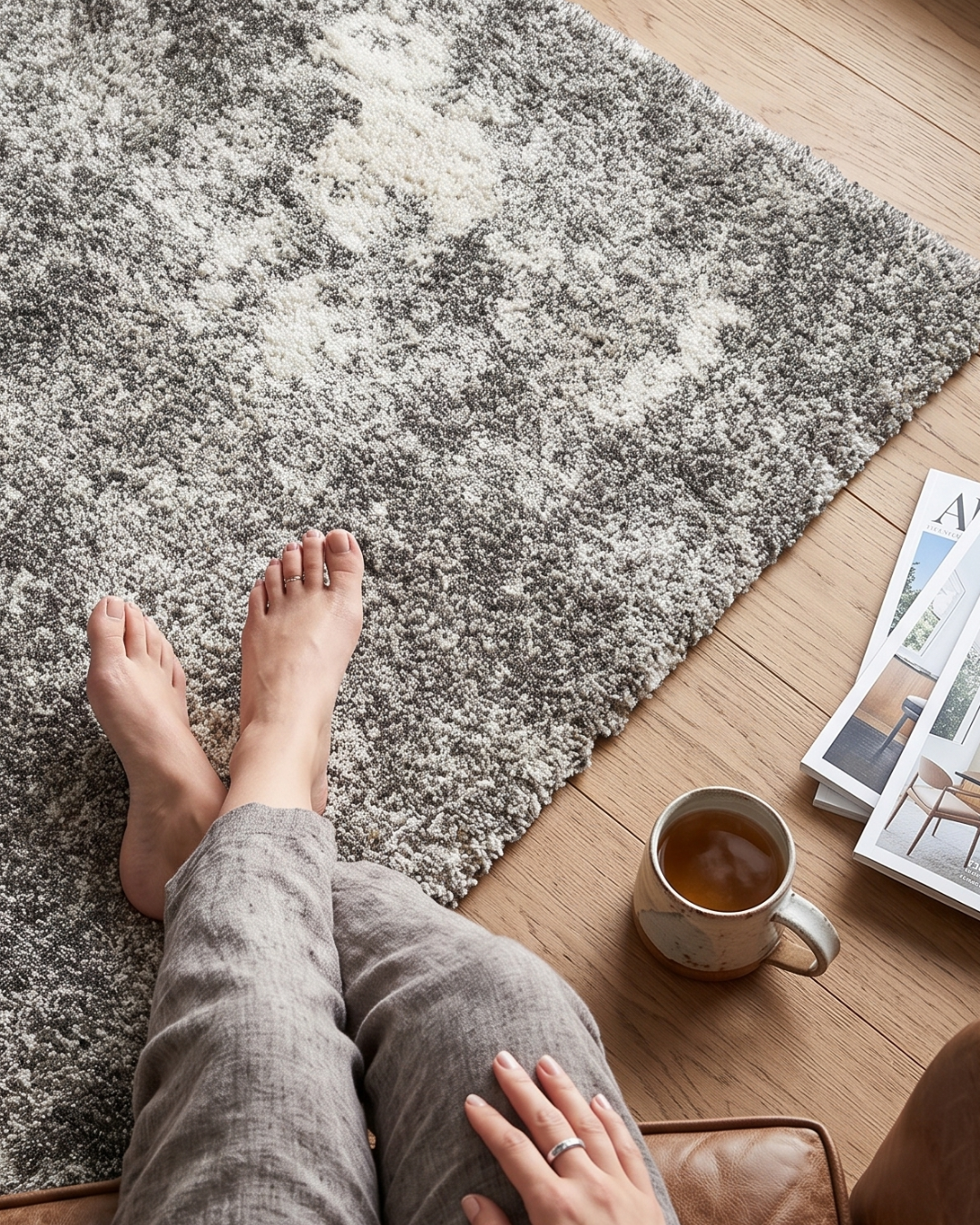 Oriental Weavers Henderson 5503H Grey Ivory plush rug with cozy seating and coffee