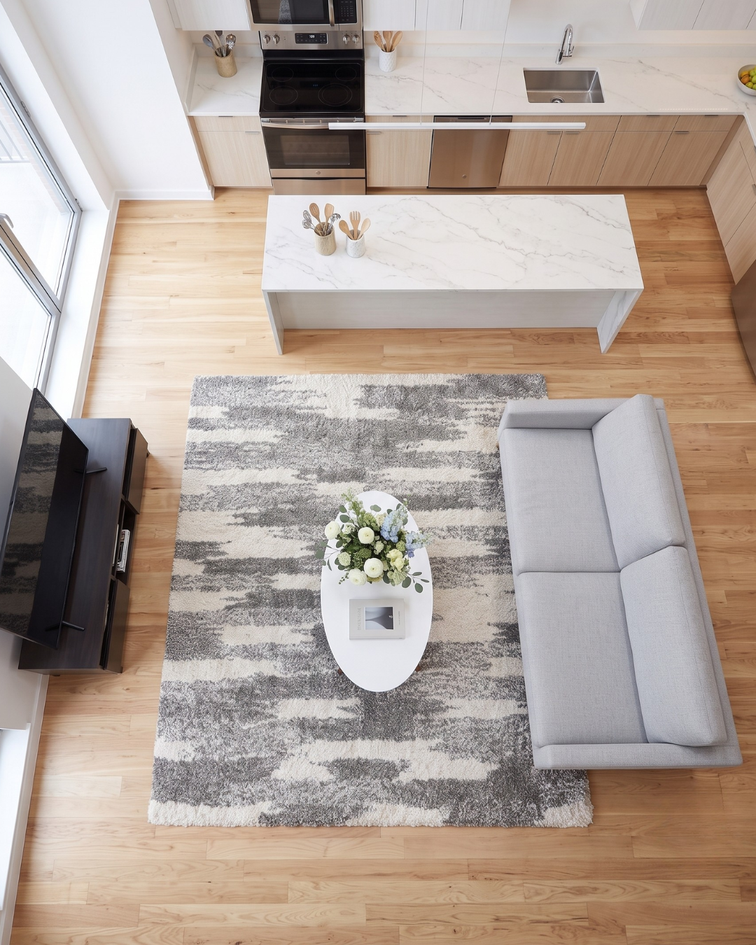 Oriental Weavers Henderson 565J9 Grey Ivory shag rug in modern living room overhead view