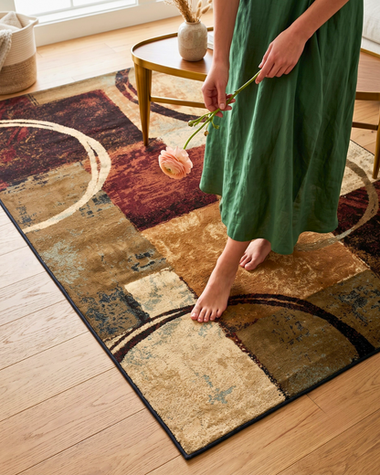 Oriental Weavers Hudson 2544B Brown Black modern rug lifestyle with woman