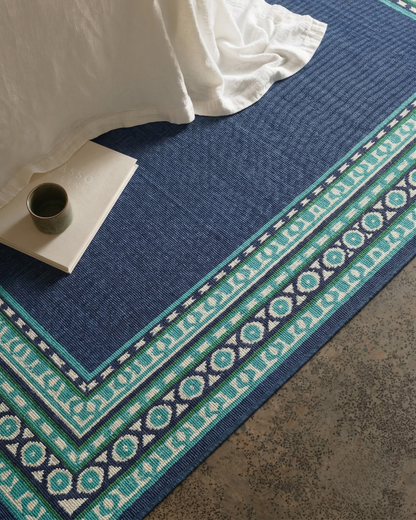 Oriental Weavers Meridian 9650B Navy Green geometric border rug style shot