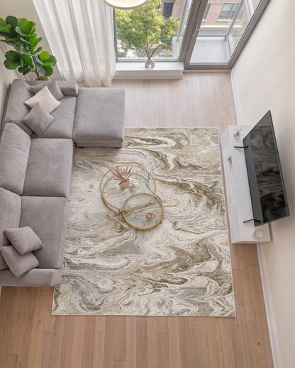 Oriental Weavers Nebulous 530E9 Ivory Tan rug in living room overhead view